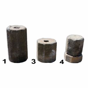 Four antique octagonal stone columns. 17th century.